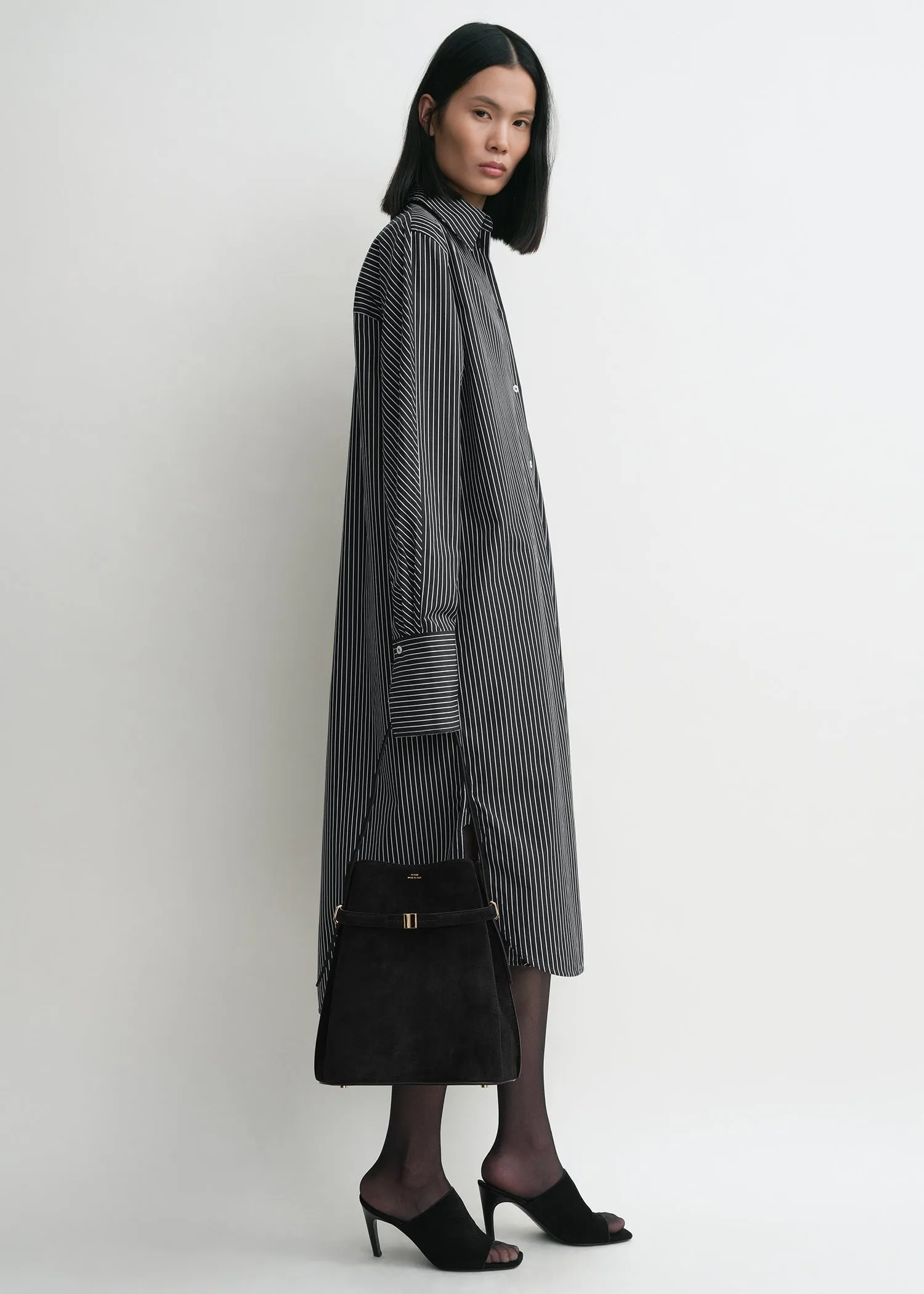 Belted suede bucket bag black